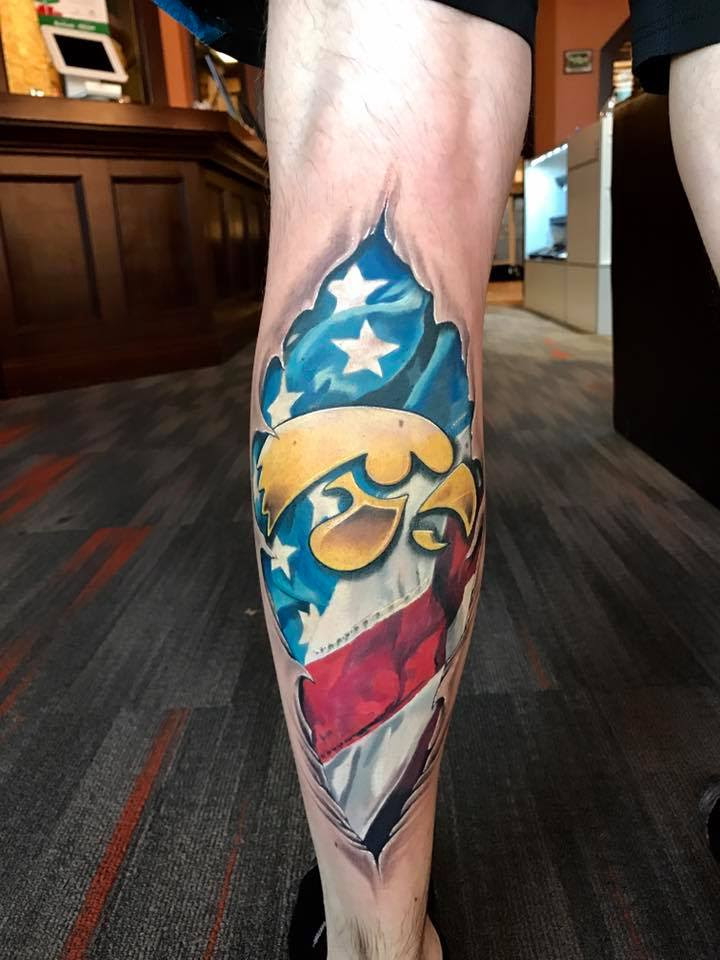 American flag and Tiger Hawk skin rip tattoo tattoo by Tyler of Neon Dragon in Cedar Rapids, Iowa